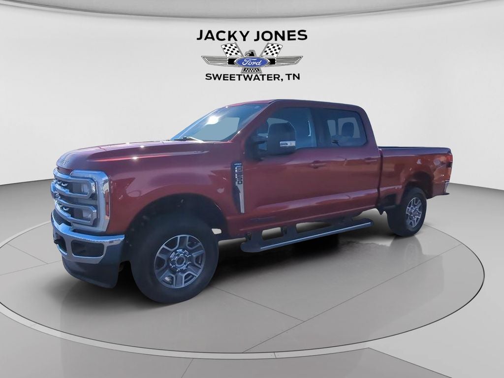 2024 Ford F-250 LARIAT in Rapid Red Metallic Tinted Clearcoat — front three-quarter view