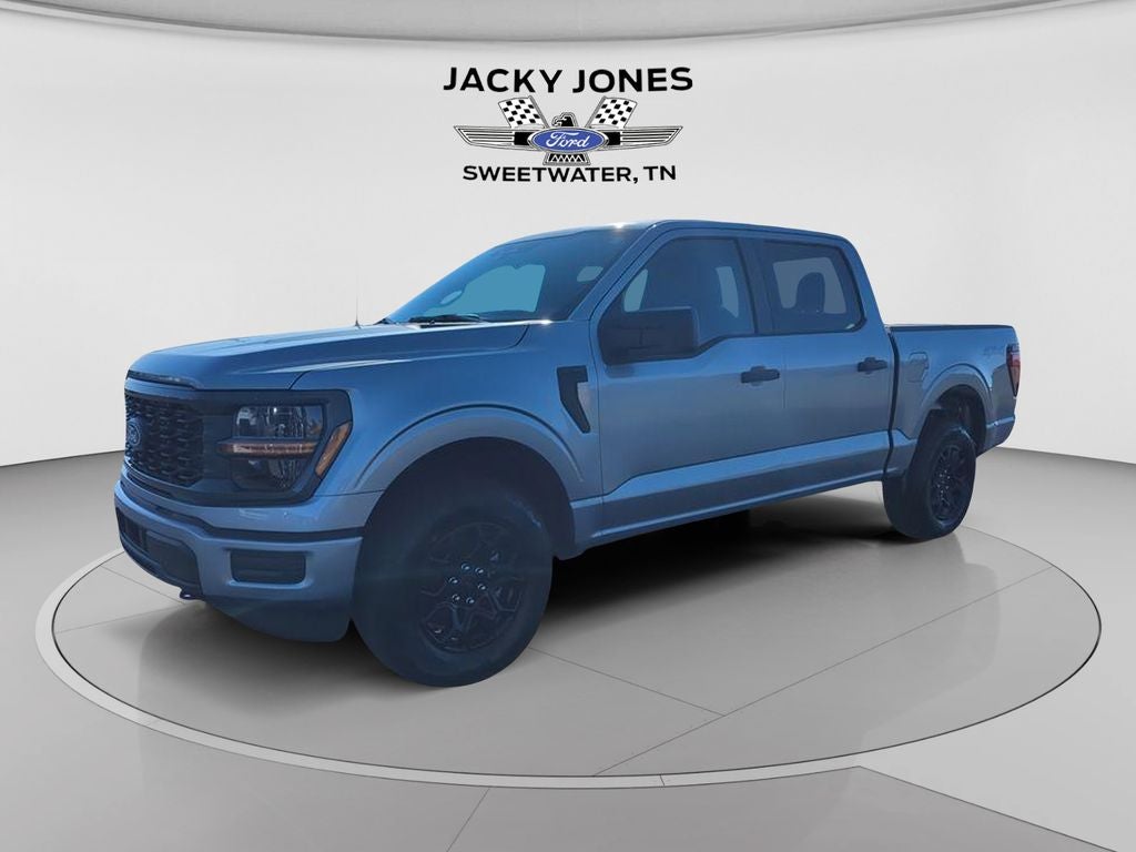 2026 Ford F-150 STX-UPCOMING DEMO in Iconic Silver Metallic — front three-quarter view