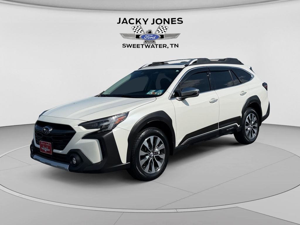 2024 Subaru Outback Touring XT in Crystal White Pearl — front three-quarter view