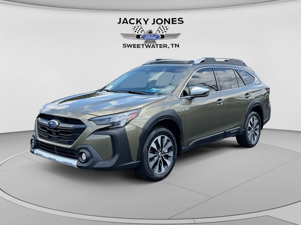 2025 Subaru Outback Touring XT in Autumn Green Metallic — front three-quarter view